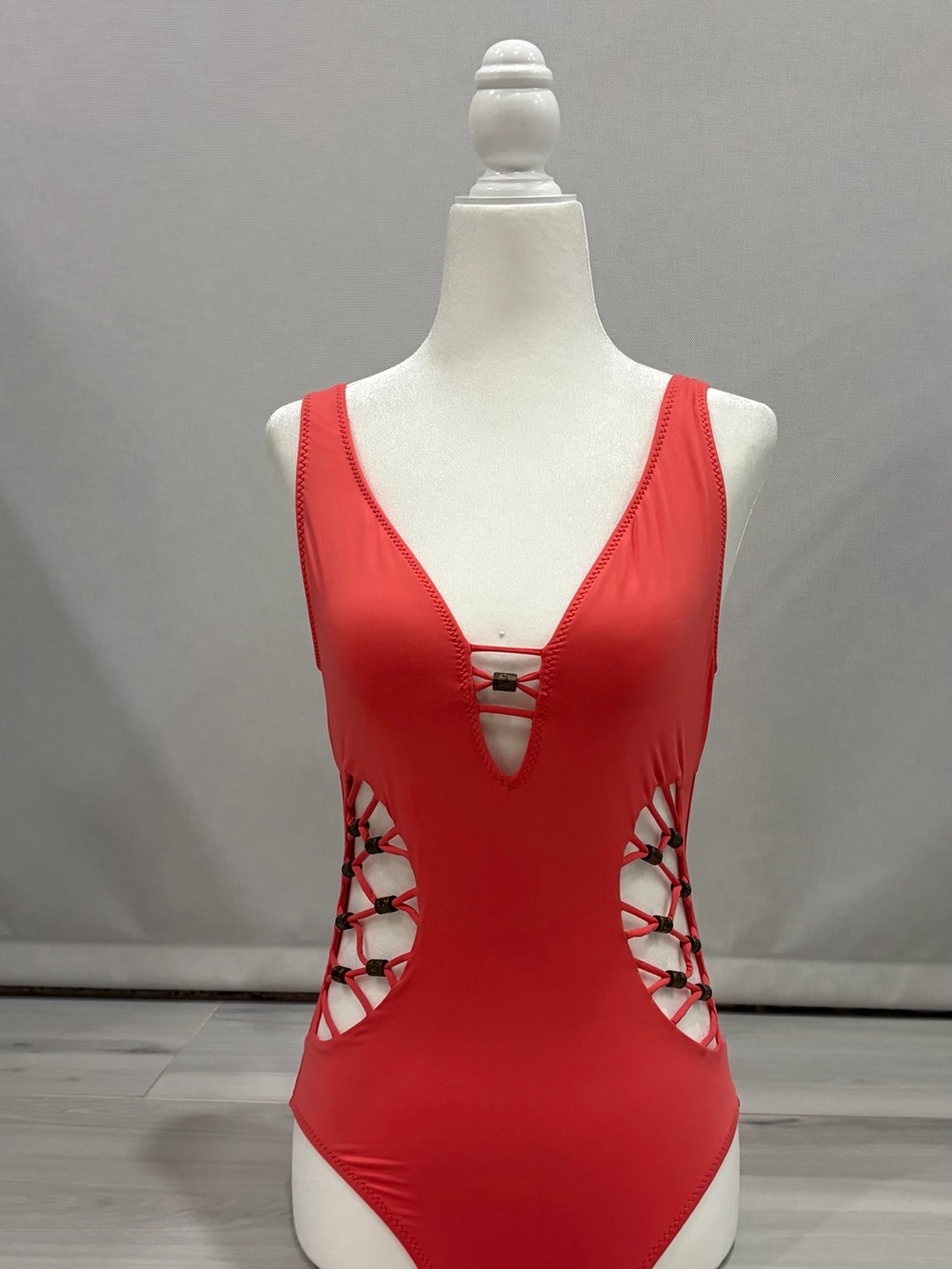 Women’s Orange One-Piece Swimwear with Side Cutouts